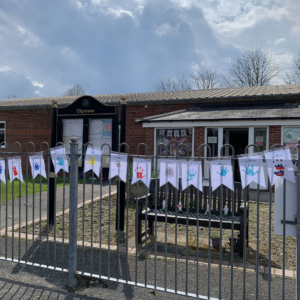 Bunting flags with handprints for a parish council event